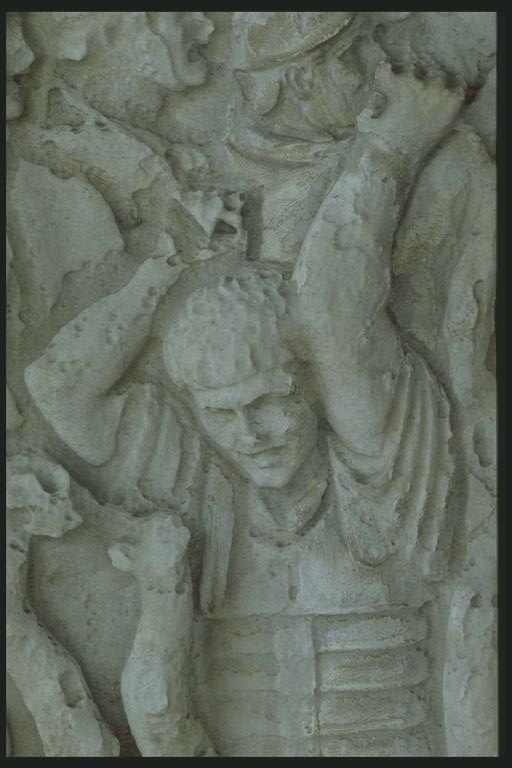 Legionary chopping wood