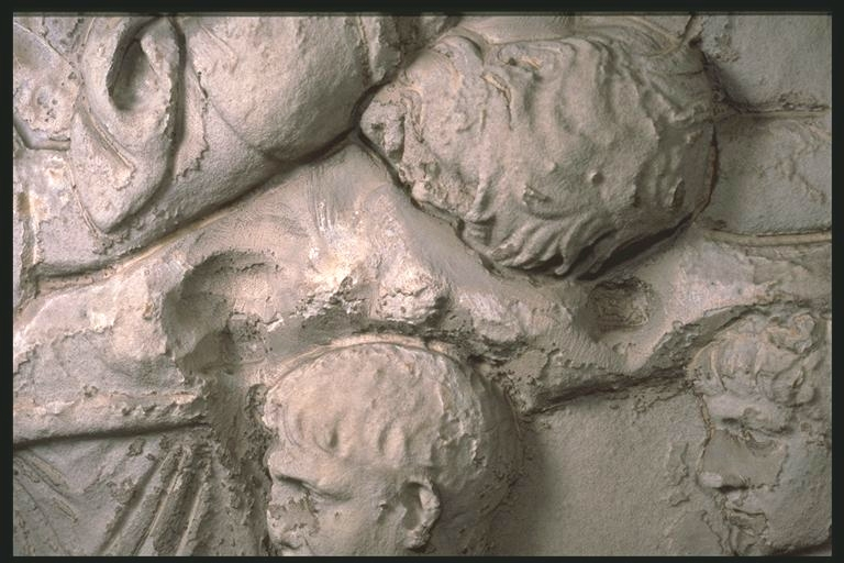 Heads of Trajan and an officer