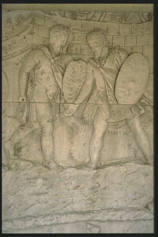 Two Dacians outside their fortress