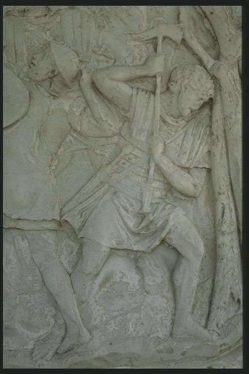 Legionary chopping wood