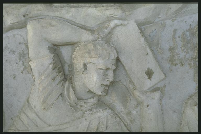 Legionary building a fort