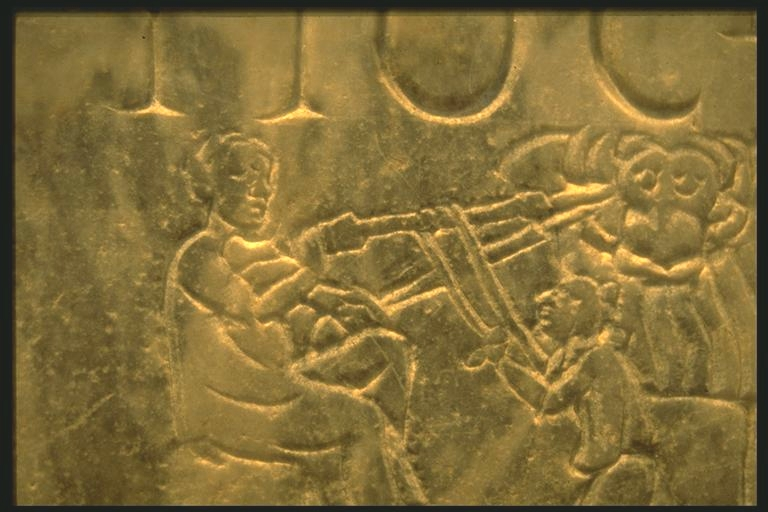 A Roman stone carver drilling