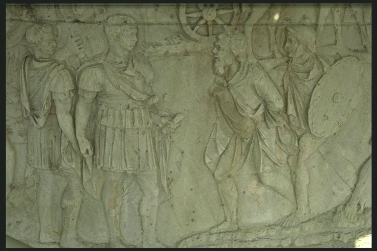 Trajan receives a Dacian prisoner